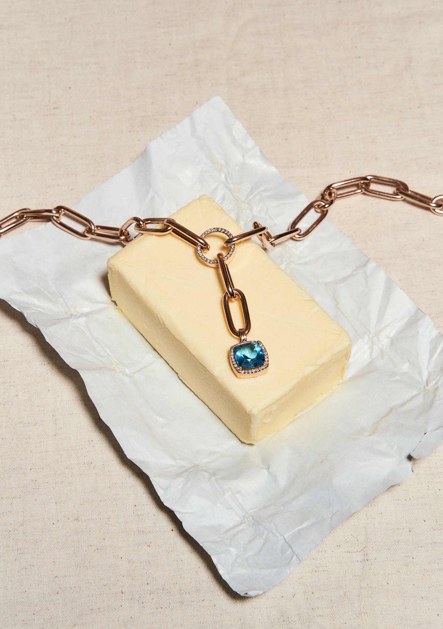 COLAR ÍCON EM PRATA BANHADO A OURO ROSA 18 KT COM TOPÁZIO